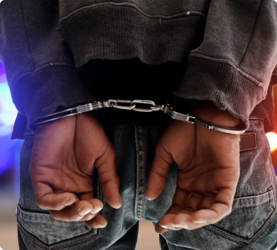 Handcuffed person in custody after a domestic dispute arrest